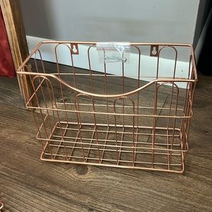 Rose gold metal basket for office storage